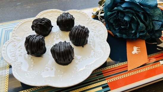 Sugarfree dryfruit laddoos dipped in dark chocolate.