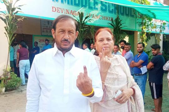 Kalka Congress candidate Pradeep Chaudhary and his wife after casting their vote in Sector 3, Panchkula, on Saturday. (Sant Arora/HT) Kalka Congress candidate Pradeep Chaudhary and his wife after casting their vote in Sector 3, Panchkula, on Saturday. (Sant Arora/HT)