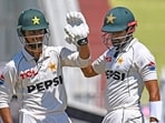 Pakistan's Saim Ayub (L) after scoring a half-century with teammate Babar Azam during a Test against Bangladesh Pakistan's Saim Ayub (L) after scoring a half-century with teammate Babar Azam during a Test against Bangladesh
