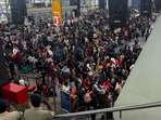 IndiGo Airlines faces chaos at Bengaluru airport due to a technical glitch, causing long delays.