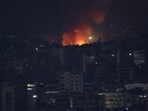 Smoke and flames rise over Beirut's southern suburbs after a strike, amid ongoing hostilities between Hezbollah and Israeli forces