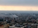 Smoke billows from the site of an Israeli air strike that targeted a neighbourhood in Beirut's southern suburbs on October 6, 2024. Israel unleashed intense strikes targeting Hezbollah on October 6, almost a year since the attack by Palestinian Hamas militants that sparked the war in Gaza. (Photo by ANWAR AMRO / AFP)(AFP)