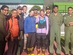 Two foreign women mountaineers, who were stranded at a height of 6,015 metres on the way to the Chaukhamba III peak in Uttarakhand's Chamoli district, after being rescued on Sunday (PTI Photo)