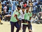 Tamil Nadu fire and rescue service personnel evacuate a man after he fainted due to heat. (ANI)