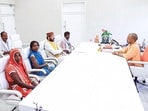 UP CM Yogi Adityanath meeting Amethi victms’ kin at his residence in Lucknow on Saturday. (ANI) UP CM Yogi Adityanath meeting Amethi victms’ kin at his residence in Lucknow on Saturday. (ANI)