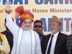 Union home minister Amit Shah campaigning for BJP candidate Syed Mushtaq Ahmed Bukhari (centre).