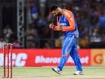 India's Varun Chakravarthy celebrates the wicket of Bangladesh's Towhid Hridoy during their first T20I match. India's Varun Chakravarthy celebrates the wicket of Bangladesh's Towhid Hridoy during their first T20I match.