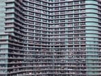 The building now houses over 20,000 people in thousands of high-end residential apartments in as many as 39 floors.