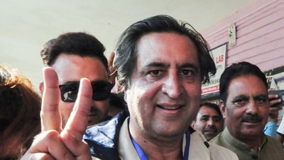Jammu and Kashmir People’s Conference president Sajad Gani Lone shows a victory sign after casting his vote. (ANI ) Jammu and Kashmir People’s Conference president Sajad Gani Lone shows a victory sign after casting his vote. (ANI )