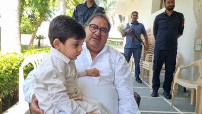 INLD’s Abhay Chautala with his grandson at his farmhouse after a hectic month of campaigning for the Haryana assembly elections. (HT Photo) INLD’s Abhay Chautala with his grandson at his farmhouse after a hectic month of campaigning for the Haryana assembly elections. (HT Photo)