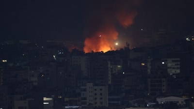 Smoke and flames rise over Beirut's southern suburbs after a strike, amid ongoing hostilities between Hezbollah and Israeli forces (REUTERS)