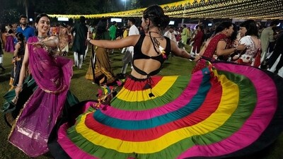 People wearing traditional attire perform Garba, a traditional dance of Gujarat state, on the second night of Navratri, or nine night festival, in Ahmedabad, India, Friday, Oct. 4, 2024. (AP) People wearing traditional attire perform Garba, a traditional dance of Gujarat state, on the second night of Navratri, or nine night festival, in Ahmedabad, India, Friday, Oct. 4, 2024. (AP)