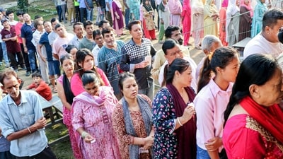 Jammu, Oct 01 (ANI): Voters wait in a queue to cast their votes for the final phase of the Jammu and Kashmir Assembly elections, at a polling station, in Jammu on Tuesday. (ANI Photo) (Shanky Rathore) (HT_PRINT) Jammu, Oct 01 (ANI): Voters wait in a queue to cast their votes for the final phase of the Jammu and Kashmir Assembly elections, at a polling station, in Jammu on Tuesday. (ANI Photo) (Shanky Rathore) (HT_PRINT)