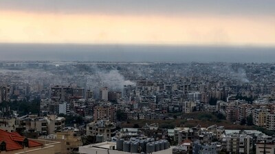 Smoke billows from the site of an Israeli air strike that targeted a neighbourhood in Beirut's southern suburbs on October 6, 2024. Israel unleashed intense strikes targeting Hezbollah on October 6, almost a year since the attack by Palestinian Hamas militants that sparked the war in Gaza. (Photo by ANWAR AMRO / AFP) (AFP)