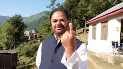 Congress candidate from Banihal constituency Vikar Rasool Wani shows his finger marked with indelible ink after casting his vote during the first phase of Jammu and Kashmir Assembly elections. (PTI) Congress candidate from Banihal constituency Vikar Rasool Wani shows his finger marked with indelible ink after casting his vote during the first phase of Jammu and Kashmir Assembly elections. (PTI)
