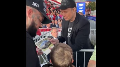A young boy's tears turned to joy at Trump's Butler rally when a Good Samaritan helped him obtain Elon Musk's autograph. (@ForgiatoBlow47/X)