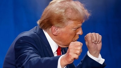 Republican presidential nominee and former U.S. President Donald Trump gestures at the end of a town hall as he campaigns in Fayetteville, North Carolina, U.S. October 4, 2024. (REUTERS)