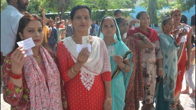 Voters waiting for their turn at Abheypur village in Panchkula on Saturday. (Sant Arora/HT) Voters waiting for their turn at Abheypur village in Panchkula on Saturday. (Sant Arora/HT)