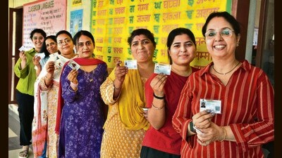Voters waiting for their turn at a polling booth in Sector 26, Panchkula, on Saturday. (Sant Arora/HT) Voters waiting for their turn at a polling booth in Sector 26, Panchkula, on Saturday. (Sant Arora/HT)