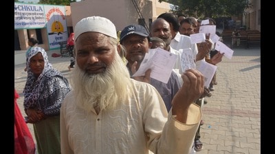 Voters waiting in a queue at a polling booth in Sector 17, Panchkula, on Saturday. (Sant Arora/Hindustan Times)