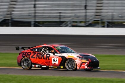 Keanu Reeves drives during the GR Cup Series auto race at Indianapolis Motor Speedway
(AP Photo/Darron Cummings) (AP) Keanu Reeves drives during the GR Cup Series auto race at Indianapolis Motor Speedway
(AP Photo/Darron Cummings) (AP)
