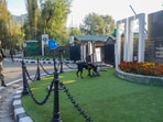 A security personnel checks the area around Sher-i-Kashmir International Convention Centre (SKICC), a counting centre for Jammu & Kashmir Assembly elections, a day before the election results, in Srinagar, on Monday. (PTI) A security personnel checks the area around Sher-i-Kashmir International Convention Centre (SKICC), a counting centre for Jammu & Kashmir Assembly elections, a day before the election results, in Srinagar, on Monday. (PTI)