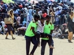 Tamil Nadu Fire and Rescue Service personnel evacuate a man after he fainted due to heat during the Indian Air Force air show. Tamil Nadu Fire and Rescue Service personnel evacuate a man after he fainted due to heat during the Indian Air Force air show.