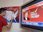 (FILES) Jake Krupa colors in an electoral map as states are projected for Republican presidential candidate Donald Trump or Democratic Presidential candidate Hillary Clinton at an election watching party in Coconut Grove, Florida, on November 8, 2016. (FILES) Jake Krupa colors in an electoral map as states are projected for Republican presidential candidate Donald Trump or Democratic Presidential candidate Hillary Clinton at an election watching party in Coconut Grove, Florida, on November 8, 2016.