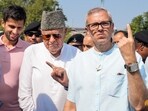 Srinagar: Jammu and Kashmir National Conference (JKNC) President Farooq Abdullah and Vice President Omar Abdullah show their fingers marked with indelible ink after casting vote during the second phase of Jammu and Kashmir Assembly elections, in Srinagar, Wednesday, Sept. 25, 2024. Srinagar: Jammu and Kashmir National Conference (JKNC) President Farooq Abdullah and Vice President Omar Abdullah show their fingers marked with indelible ink after casting vote during the second phase of Jammu and Kashmir Assembly elections, in Srinagar, Wednesday, Sept. 25, 2024.