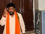 Former minister Gopal Kanda casts his vote at a polling station during the Haryana Assembly elections, in Sirsa.