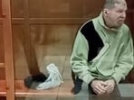 Stephen Hubbard, a U.S. citizen accused of fighting as a mercenary for Ukraine against Russia in the course of a military conflict, is seen inside an enclosure for defendants as he attends a court hearing in Moscow, Russia October 7, 2024, in this still image taken from video. 