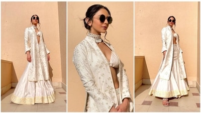 Bored with traditional lehengas and gowns? Get inspired by Rakul Preet's three-piece lehenga set, which features a V-neckline bralette, an embellished jacket, and flared sharara pants for a modern ethnic look. (Instagram/@rakulpreet) Bored with traditional lehengas and gowns? Get inspired by Rakul Preet's three-piece lehenga set, which features a V-neckline bralette, an embellished jacket, and flared sharara pants for a modern ethnic look. (Instagram/@rakulpreet)
