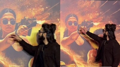 Ranveer showers Deepika's poster with love at Singham Again trailer launch Ranveer showers Deepika's poster with love at Singham Again trailer launch