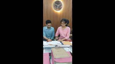 Kumari Sanjivani Rajesh holding post of chief development officer, Varanasi for day with CDIO Himanshu Nagpal. (HT PHOTO) Kumari Sanjivani Rajesh holding post of chief development officer, Varanasi for day with CDIO Himanshu Nagpal. (HT PHOTO)