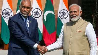 Prime Minister Narendra Modi shakes hands with Maldives President Mohamed Muizzu prior to a meeting at Hyderabad House, in New Delhi. (PTI)