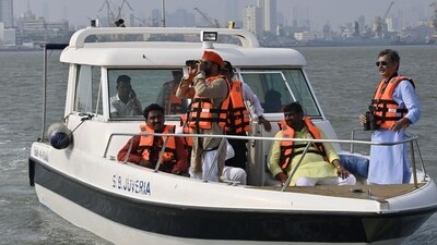 Sambhajiraje, who once was a BJP Rajya Sabha MP, attempted to inspect the proposed site by going into the Arabian Sea. Since boats are not allowed there, he used binoculars to see if any work was in progress. (Anshuman Poyrekar/ Hindustan Times) Sambhajiraje, who once was a BJP Rajya Sabha MP, attempted to inspect the proposed site by going into the Arabian Sea. Since boats are not allowed there, he used binoculars to see if any work was in progress. (Anshuman Poyrekar/ Hindustan Times)