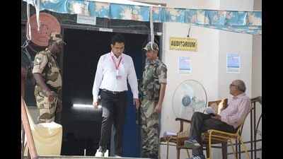 Security personnel stationed outside the strongroom in Panchkula on Monday. (HT Photo) Security personnel stationed outside the strongroom in Panchkula on Monday. (HT Photo)