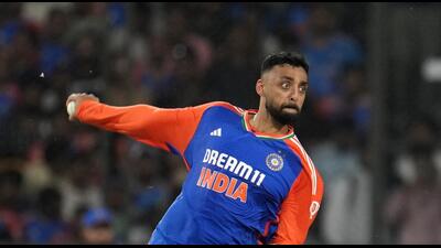 Spinner Varun Chakravarthy made an impressive India comeback, taking three wickets in Sunday’s win over Bangladesh in the first T20 international in Gwalior on Sunday. (AP) Spinner Varun Chakravarthy made an impressive India comeback, taking three wickets in Sunday’s win over Bangladesh in the first T20 international in Gwalior on Sunday. (AP)
