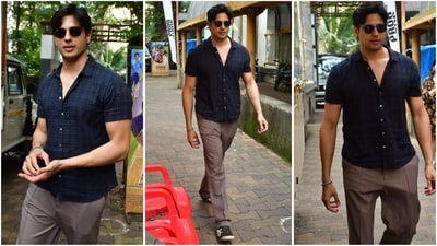 Sidharth Malhotra's recent casual look features a blue checked shirt paired with brown pants, blue sneaker shoes, and black sunglasses, making for a stylish yet relaxed outfit. (Instagram)