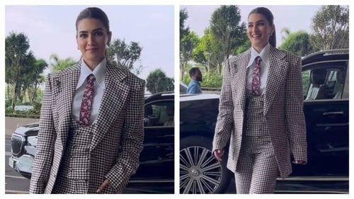 Kriti Sanon wore burgundy tie and shoes for a pop of colour in her monochrome outfit. (Instagram/@bollywoodchronicle) Kriti Sanon wore burgundy tie and shoes for a pop of colour in her monochrome outfit. (Instagram/@bollywoodchronicle)