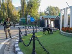 A security personnel checks the area around Sher-i-Kashmir International Convention Centre (SKICC), a counting centre for Jammu & Kashmir Assembly elections. A security personnel checks the area around Sher-i-Kashmir International Convention Centre (SKICC), a counting centre for Jammu & Kashmir Assembly elections.