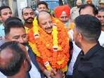 Jammu, Oct 08 (ANI): Bharatiya Janata Party (BJP) candidate Devender Singh Rana being garlanded by party supporters as he wins from Nagrota seat in the Jammu and Kashmir Assembly election, in Jammu on Tuesday. (ANI Photo)
