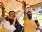 AAP candidate Mehraj Malik (R) with MP Sanjay Singh.