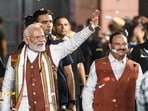 Prime Minister Narendra Modi greets Bharatiya Janata Party (BJP) workers and leaders after the party's victory in the Haryana Assembly elections, at the party headquarter in New Delhi on Tuesday. 