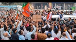 Kurukshetra: Haryana Chief Minister Nayab Saini greets supporters after winning the Assembly elections from Ladwa constituency, at Ladwa, in Kurukshetra district, Tuesday, Oct. 8, 2024. (PTI Photo) (PTI)