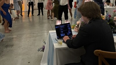 The co-founder of an AI startup was seen working on a laptop at his own wedding (LinkedIn//torrey-leonard)
