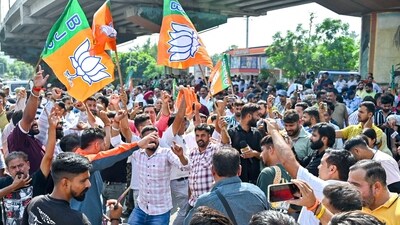 Supporters of the Bharatiya Janata Party (BJP) celebrated in Jammu on Tuesday after the party achieved significant gains, winning 29 seats. This marks its best performance in J&K to date, up from 25 seats in the 2014 elections. Despite the loss of J&K BJP president Ravindra Raina, the party's vote share rose from 23 per cent in 2014 to 25.64 per cent this year. (ANI) Supporters of the Bharatiya Janata Party (BJP) celebrated in Jammu on Tuesday after the party achieved significant gains, winning 29 seats. This marks its best performance in J&K to date, up from 25 seats in the 2014 elections. Despite the loss of J&K BJP president Ravindra Raina, the party's vote share rose from 23 per cent in 2014 to 25.64 per cent this year. (ANI)