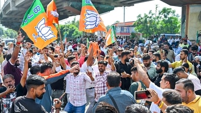 BJP supporters celebrate during the counting of votes in Jammu on Tuesday. (ANI) BJP supporters celebrate during the counting of votes in Jammu on Tuesday. (ANI)