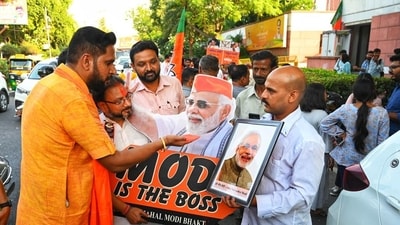 BJP supporters celebrate at BJP HQ after assembly election results in Delhi, on Tuesday. (HT Photo) BJP supporters celebrate at BJP HQ after assembly election results in Delhi, on Tuesday. (HT Photo)
