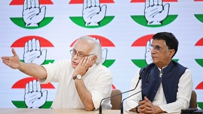 BJP leaders Jairam Ramesh and Pawan Khera address press conference at the AICC headquarters in New Delhi. (Photo by Sanchit Khanna/ Hindustan Times) 